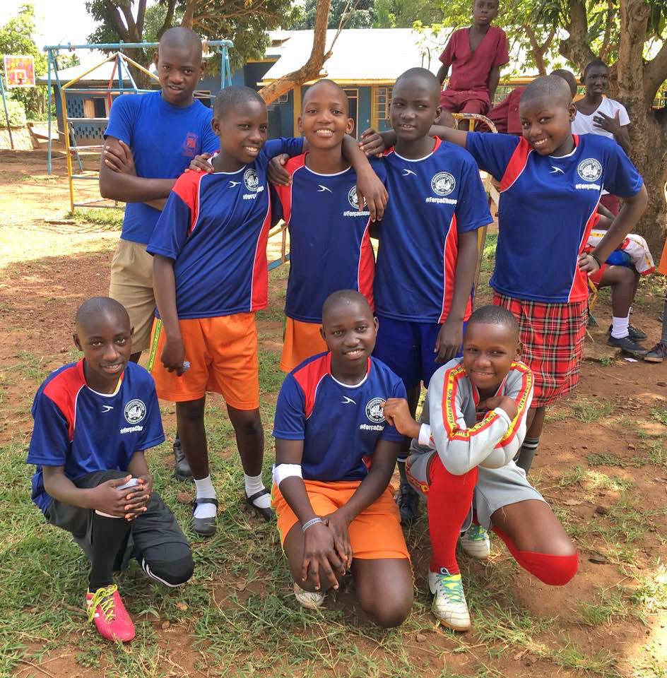13-16 year old girls from Mulago School of the Deaf. Girls in Uganda shave their heads for uniformity and cleanliness.