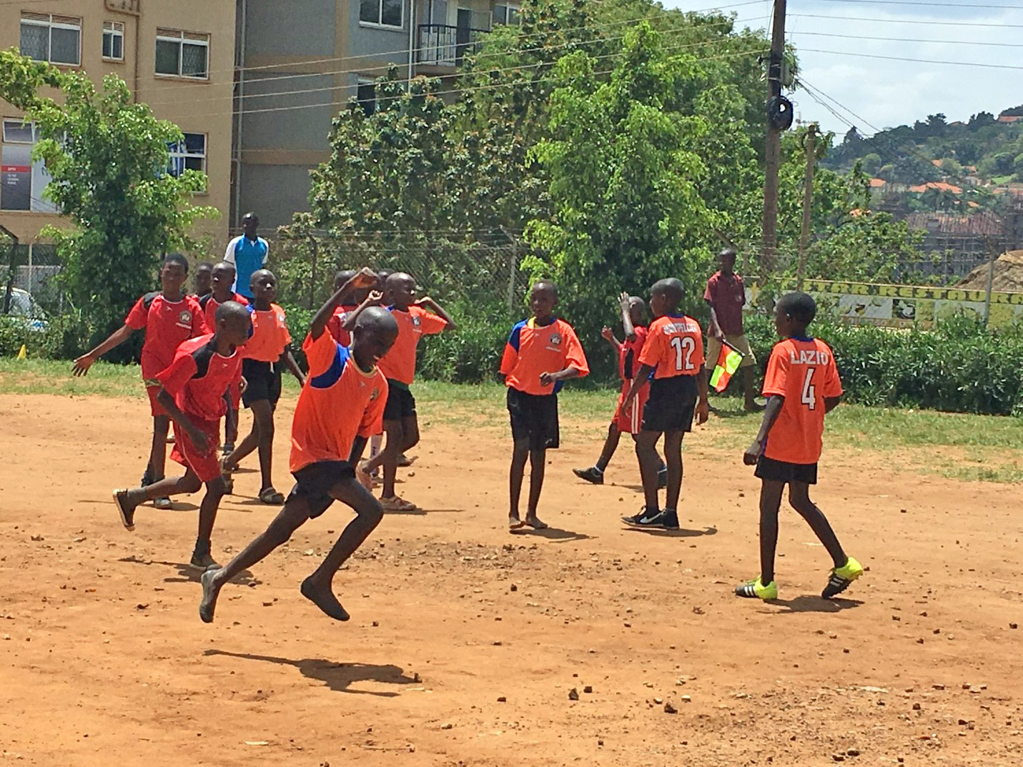 Girls from Buguyere Deaf School celebrate their goal against Ntinda in the 2017 Promoting Play.