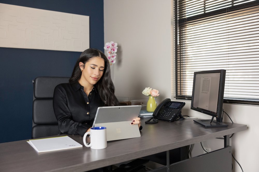  Woman working ta desk - JHA CPA 