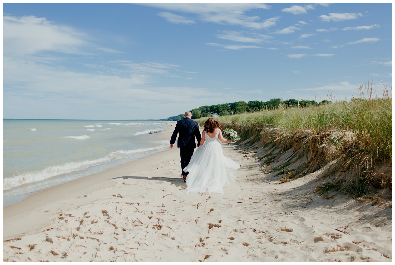 jeanklockweddingbentonharbormichiganphotojournaliststyledestinationwedding32.jpg