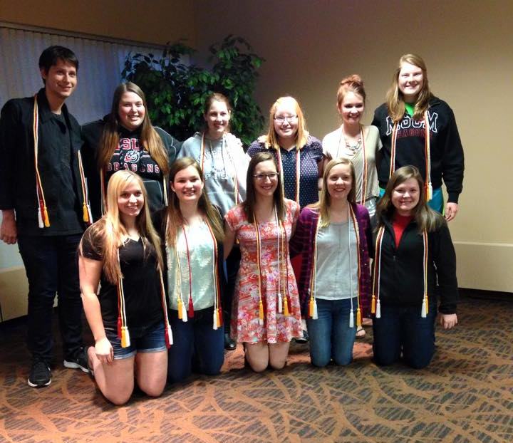 graduating seniors, with their honor cords, from minnesota state university moorhead