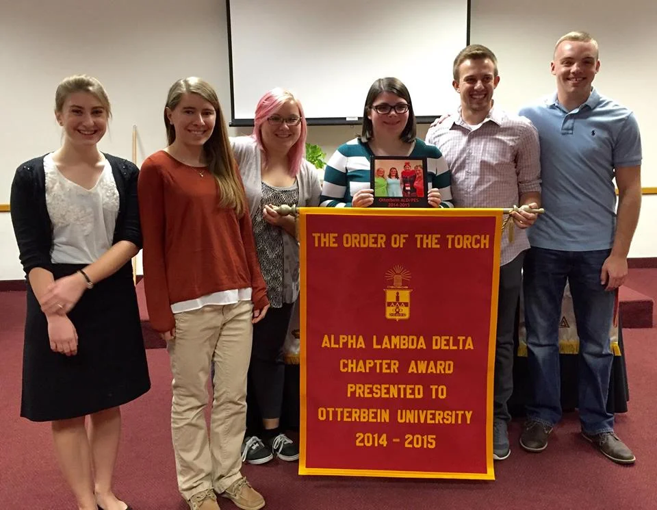 otterbein university receiving the order of the torch award