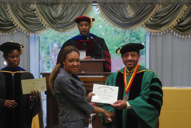 new member at norfolk state university receiving her certificate