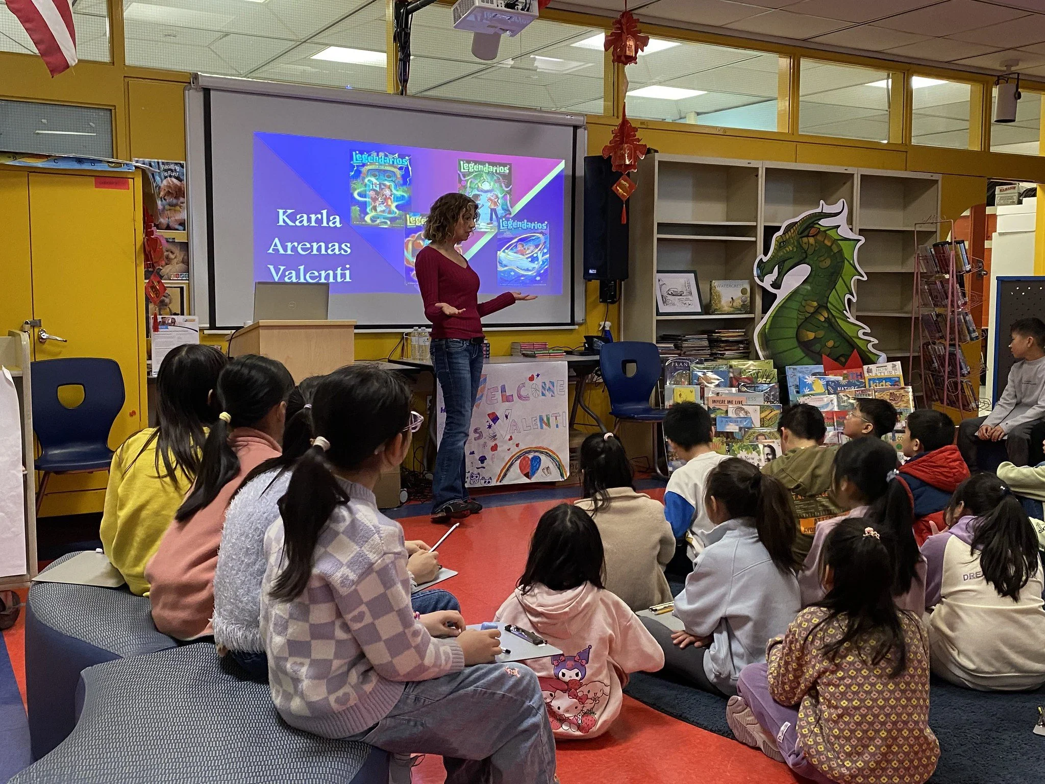 Karla Arenas Valenti talks about her Legendarios series with students at Josiah Quincy Elementary School in Chinatown (Copy)