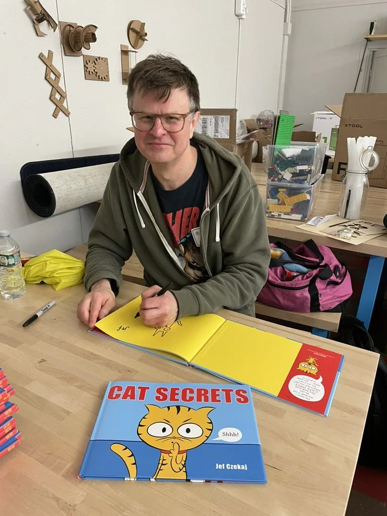 Longtime partnering author Jef Czekaj signs books for students at Winship Elementary in Brighton (Copy)