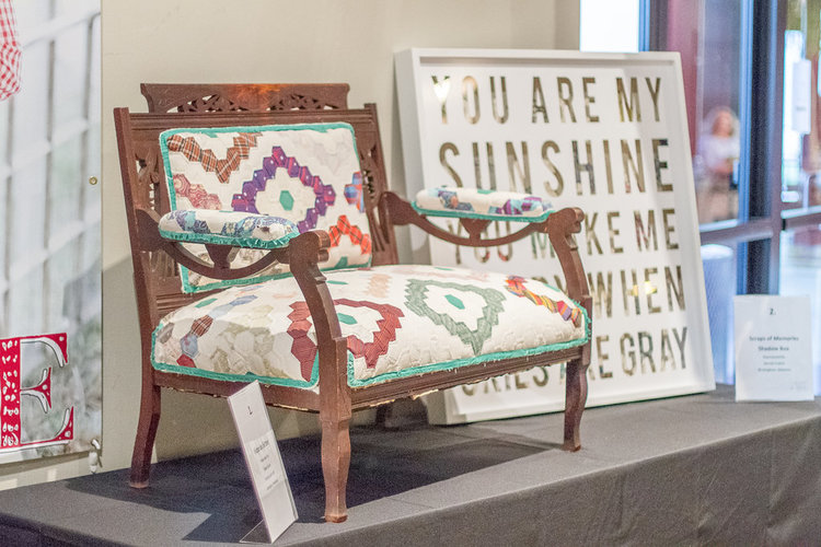 Antique bench upholstered with an old quilt | City Farmhouse Pop Up Fair 