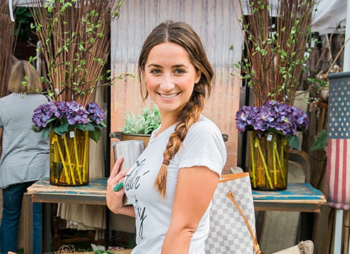 A shopper at the June City Farmhouse Pop Up Fair