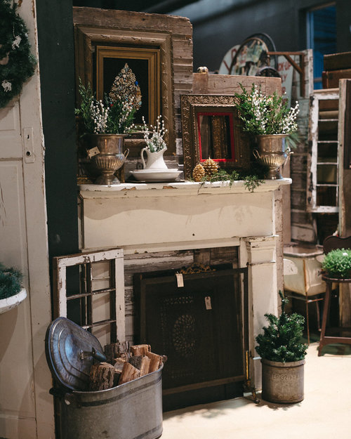 Charming farmhouse style fireplace at the November City Farmhouse Pop Up Fair