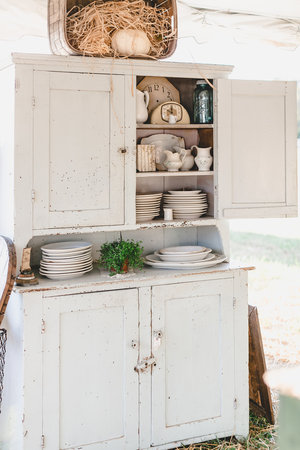 Antique hutch with white chippy paint at the City Farmhouse Pop Up Fair