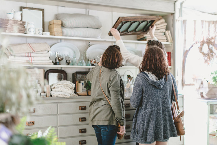 Two women shopping the City Farmhouse Pop Up Fair | Franklin, TN