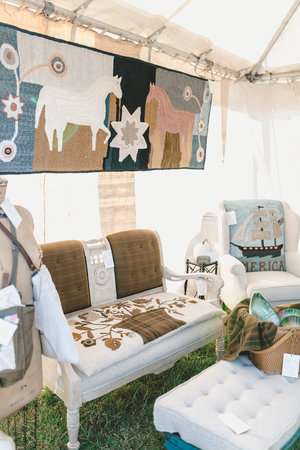 Eclectic vintage couch and quilt at the City Farmhouse Pop Up Fair | Franklin, TN