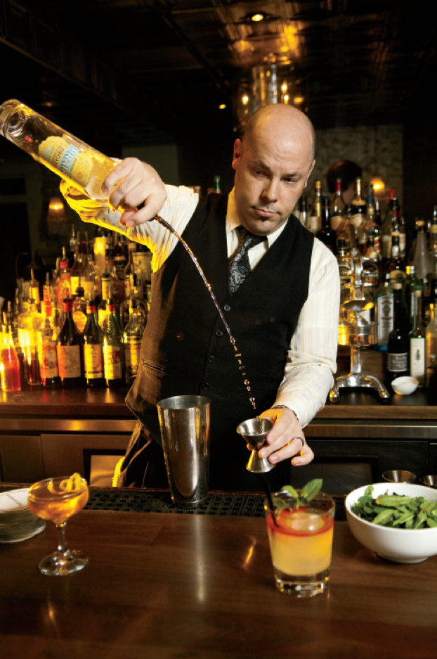 The Patterson House bartender crafting an artisanal cocktail.png