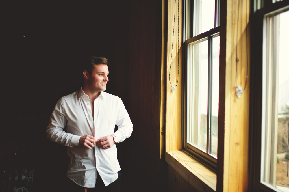 mint springs farm wedding: groom getting ready