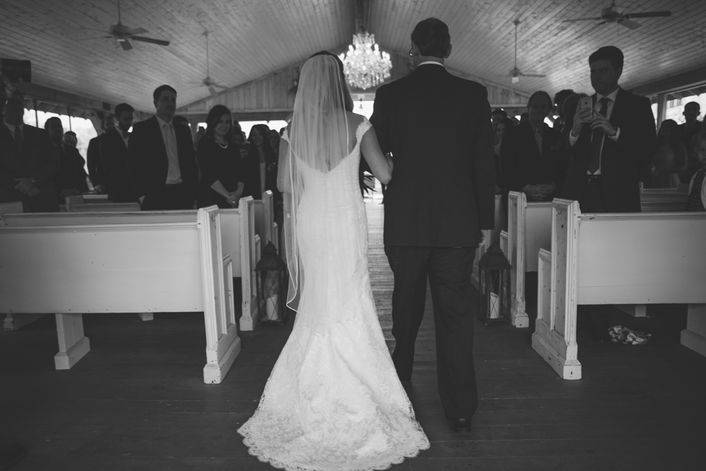 mint springs farm wedding: bride walking down aisle