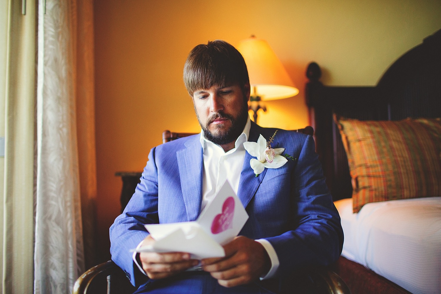 pierre's restaurant wedding: groom reading letter