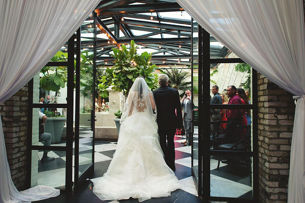 oxford exchange wedding : bride adn dad walking in