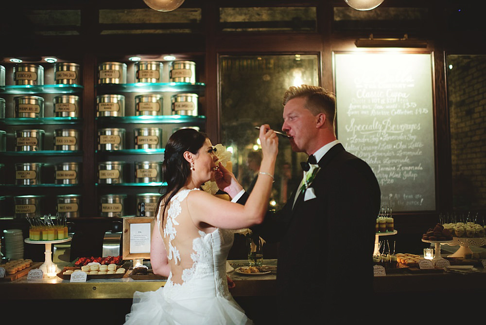 oxford exchange wedding : cake feeding