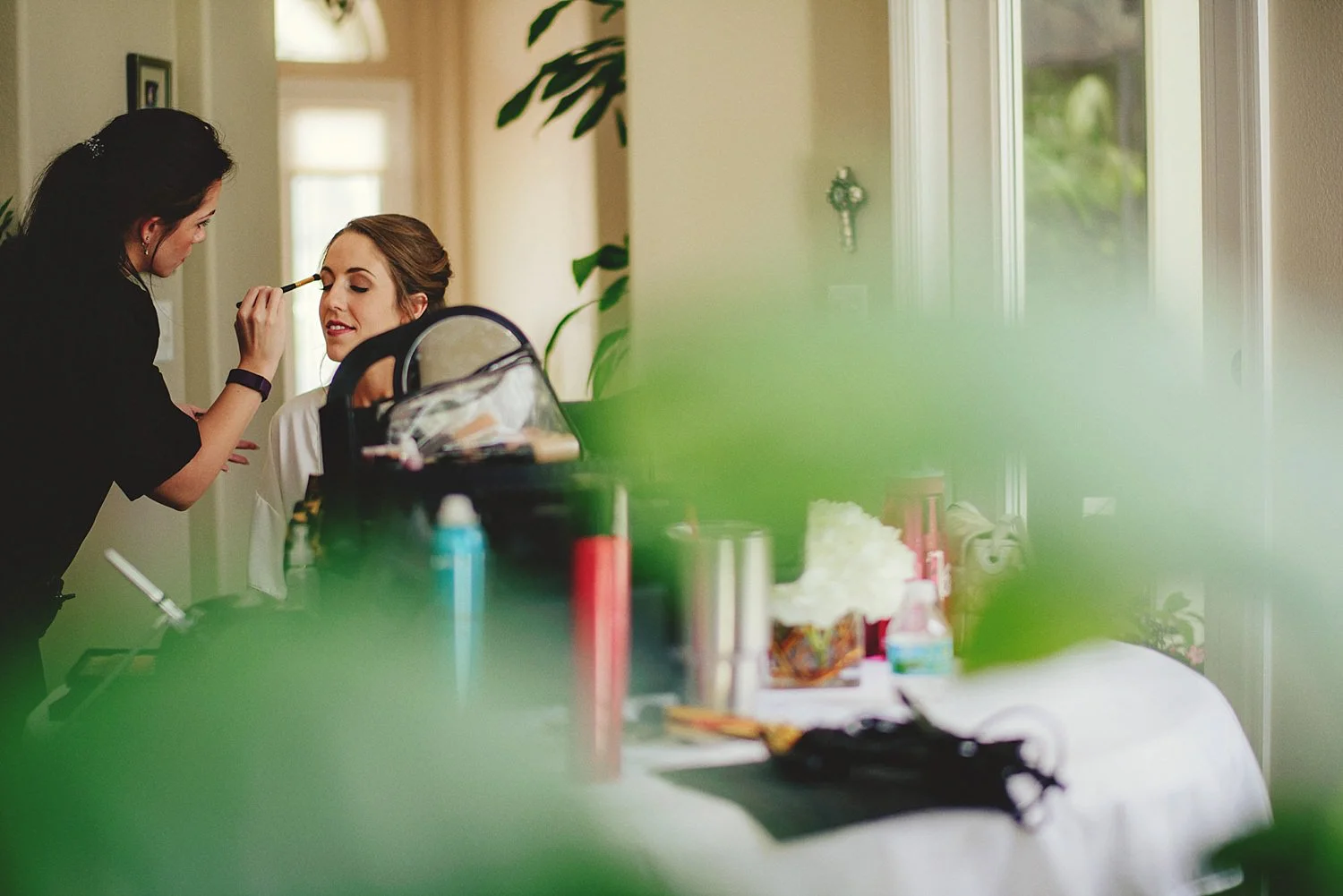 knowles memorial chapel wedding: bride getting makeup