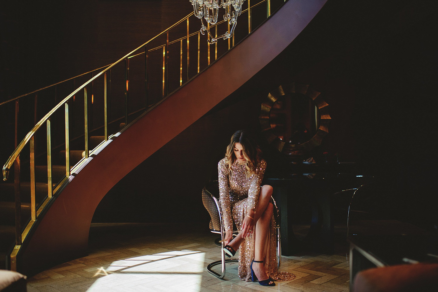 las vegas bride putting on blue suede shoes