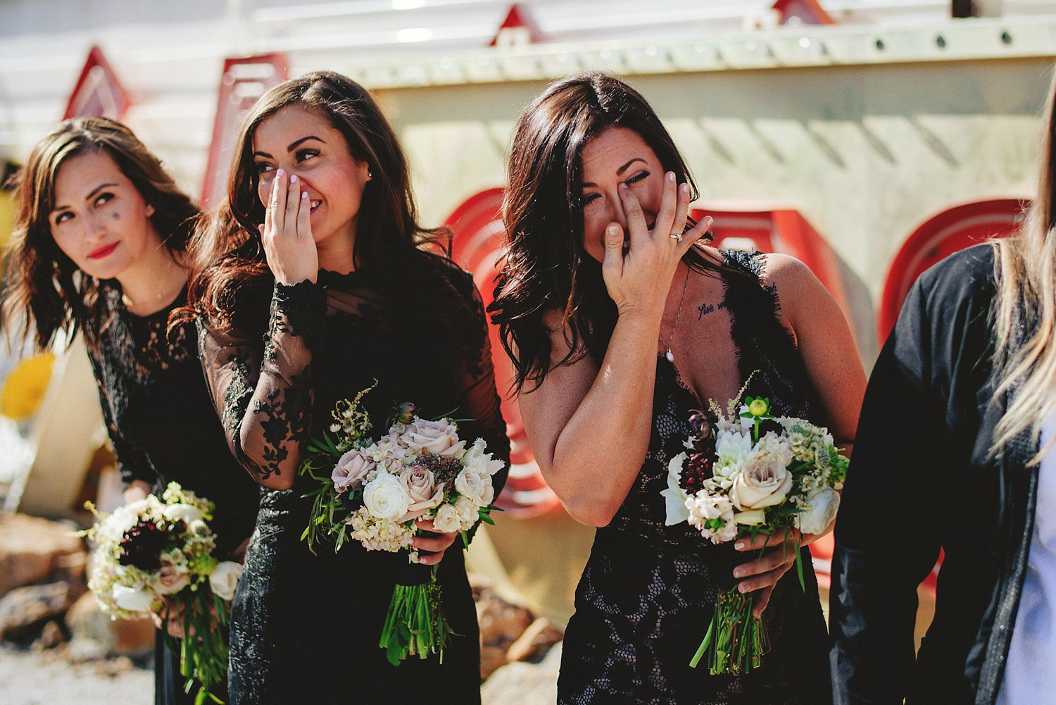 neon museum wedding - bridesmaids crying