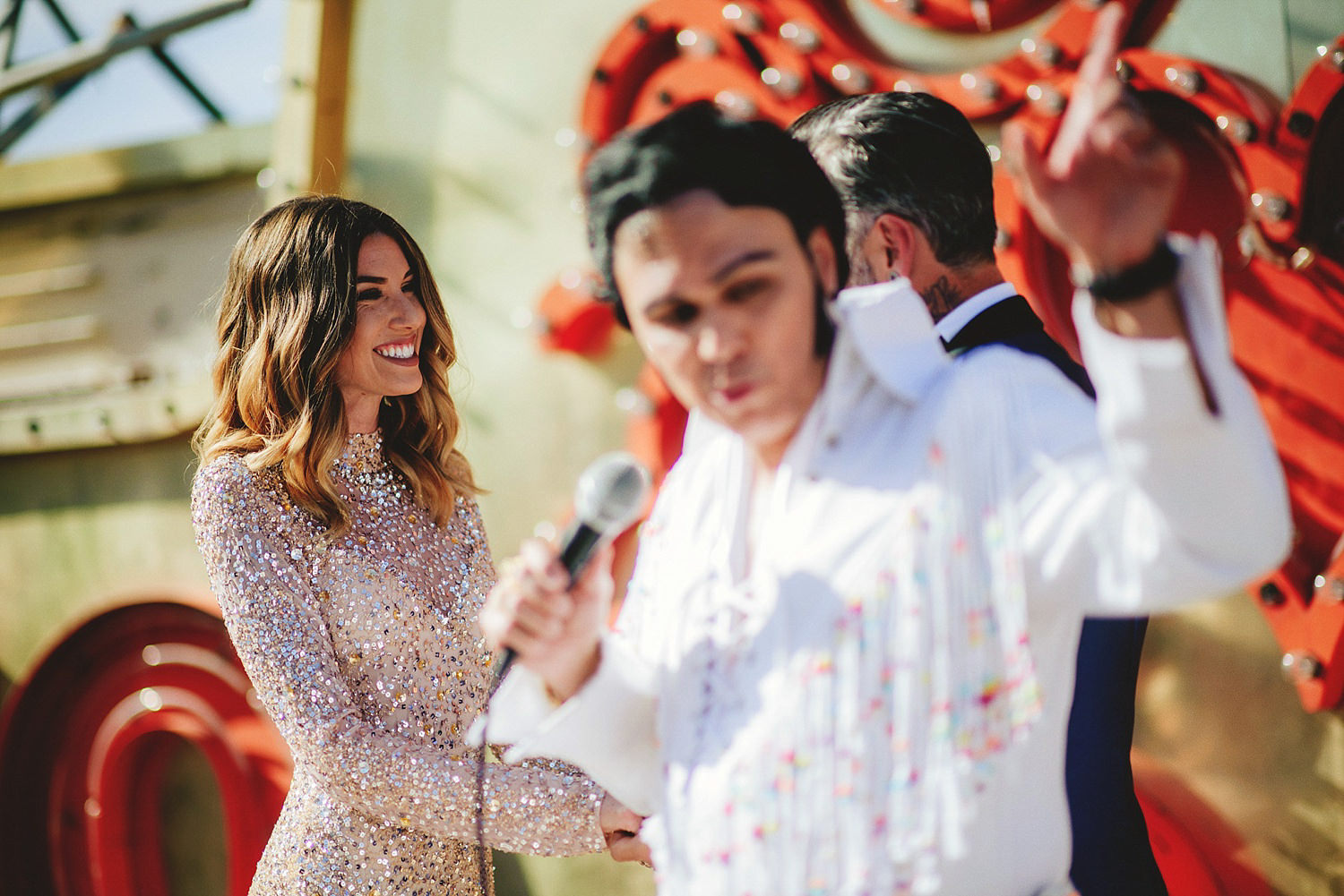 neon museum wedding - bride saying vows