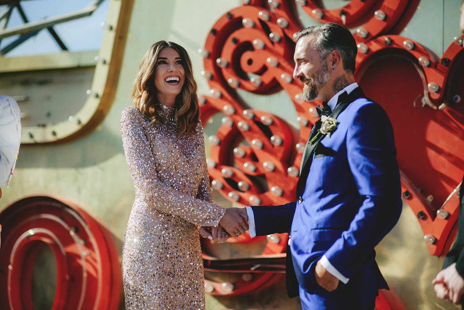 neon museum wedding - bride laughing