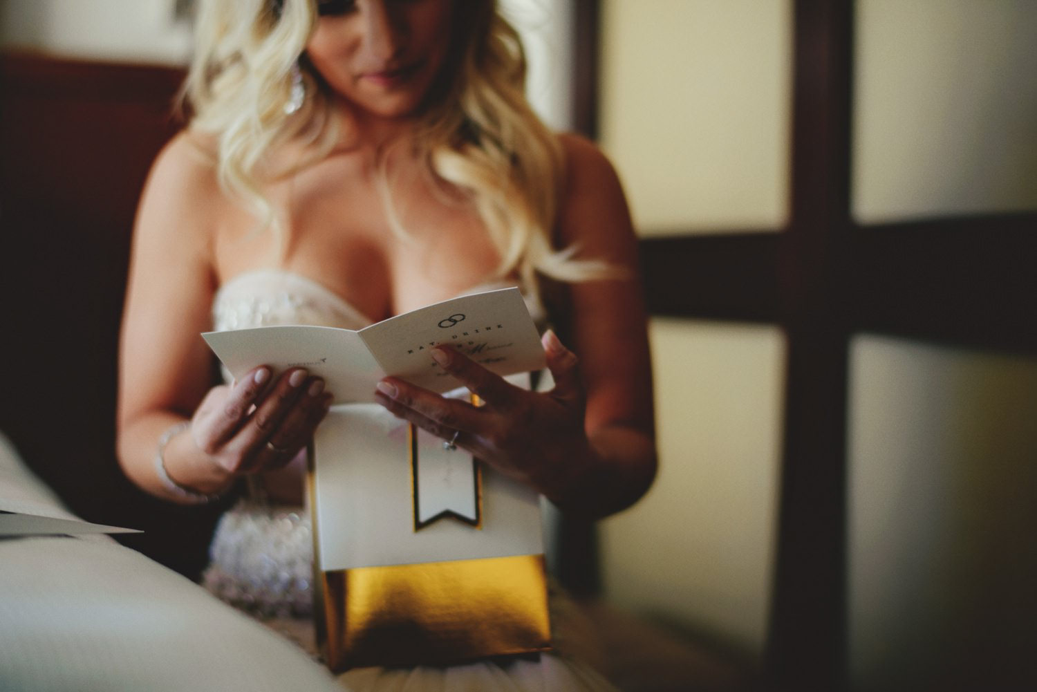 editorial ringling wedding: bride reading letter