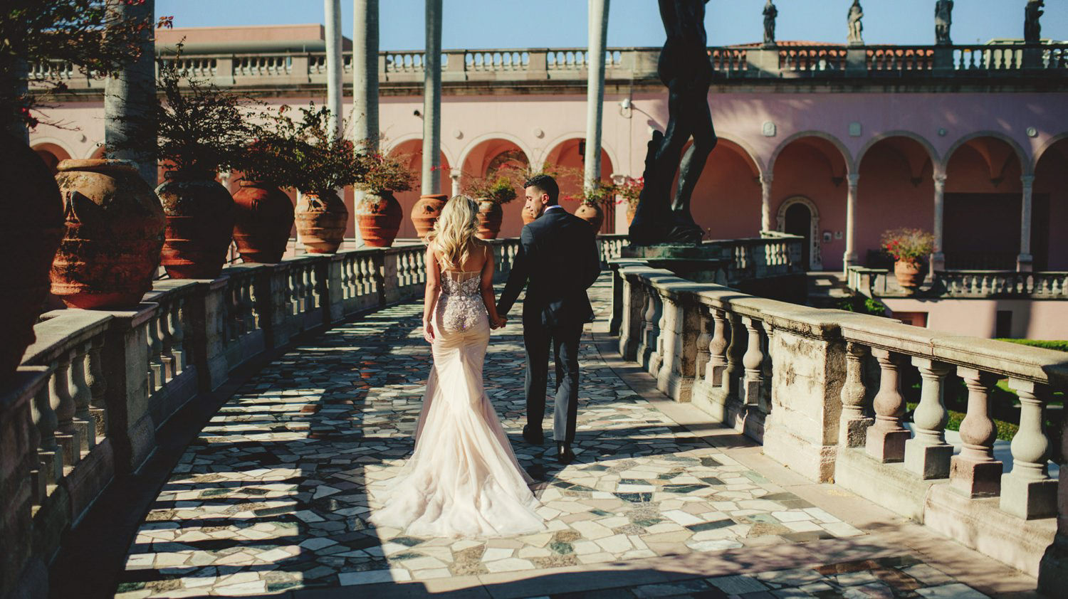 editorial ringling wedding: bride and groom walking