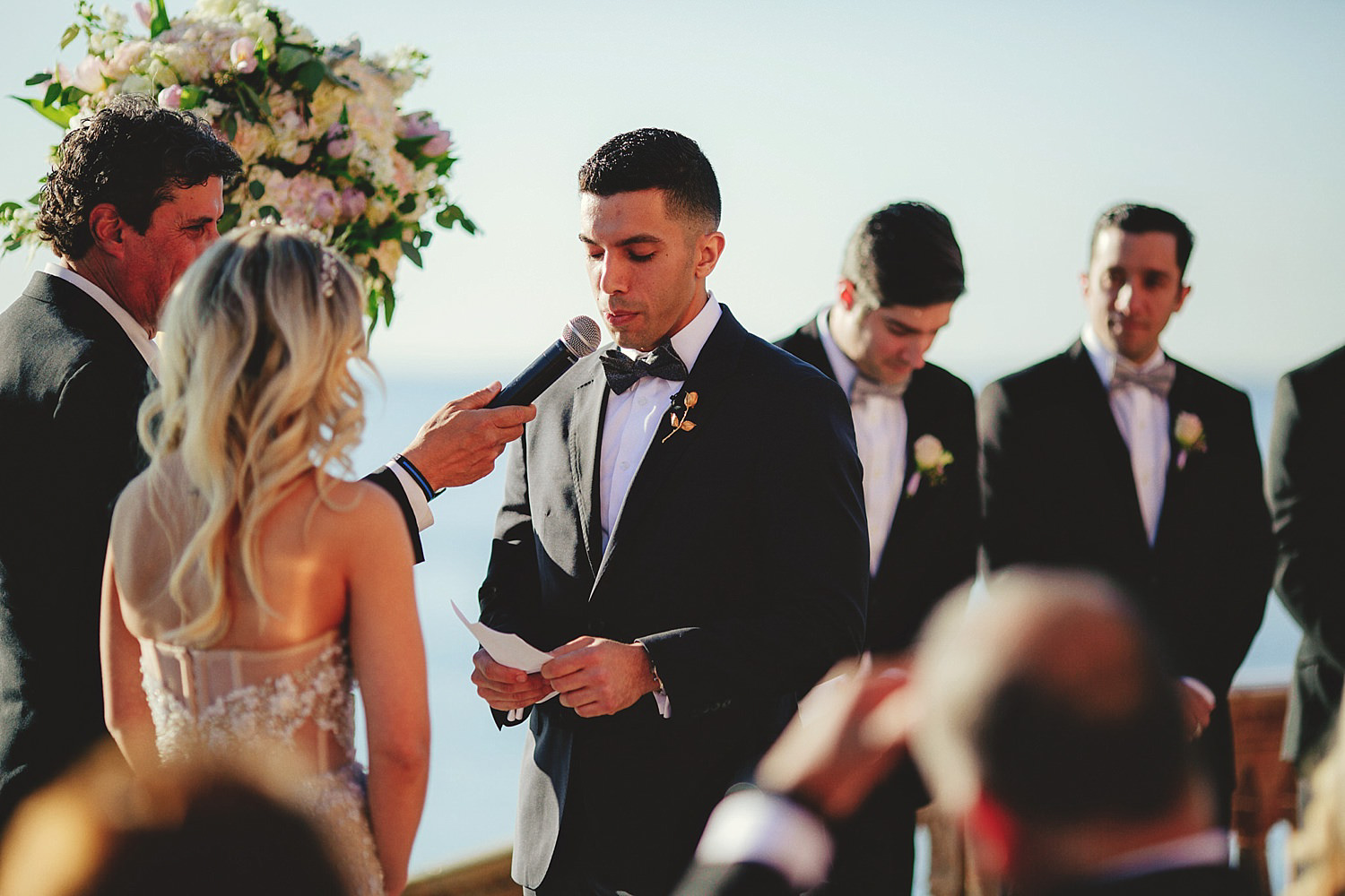 editorial ringling wedding: groom saying vows