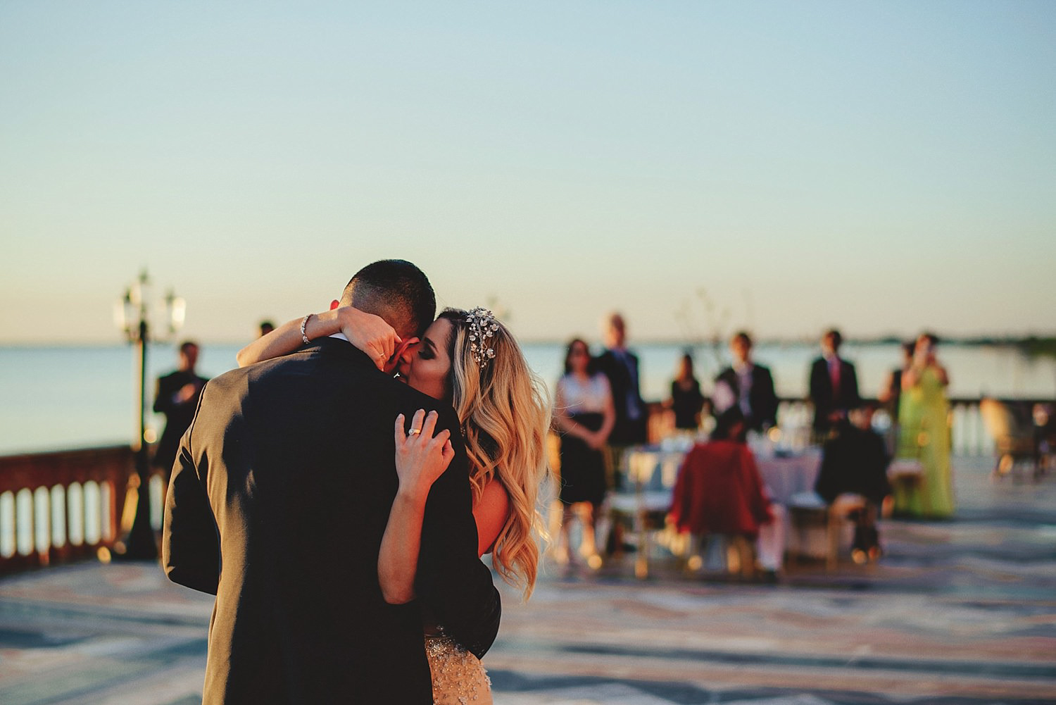 editorial ringling wedding: bride and groom dancing for the firs