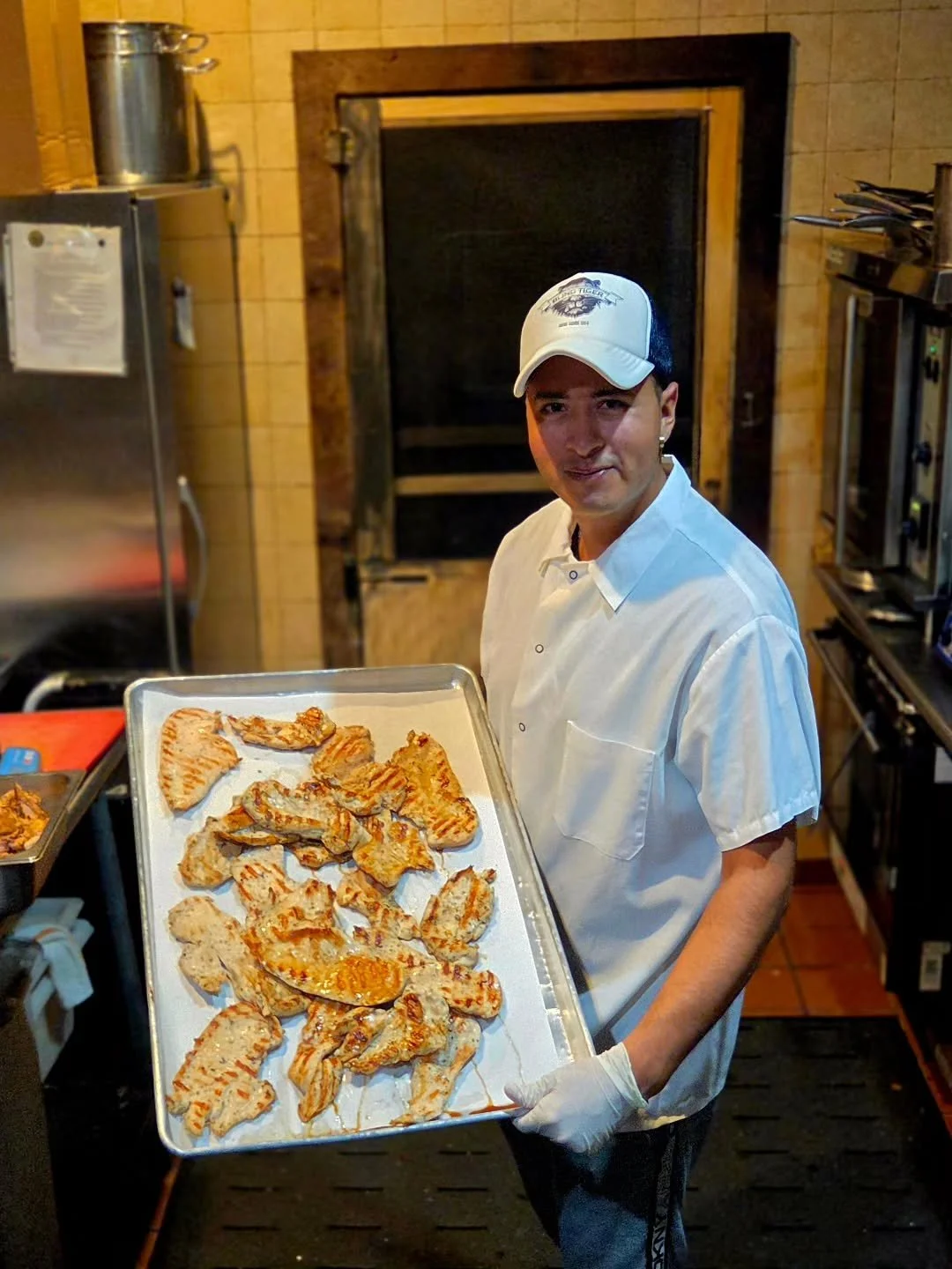 Meet Jonathan! He's one of our incredibly hard-working cooks here at the Blind Tiger and today he's rocking our BT trucker hat. You can snag one too, along with our other merch, in house or in the shop section of our website! Link in bio.
