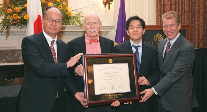 At signing ceremony (L to R): Reiichiro Takahashi, Jerome Cohen, Ren Ito, Trevor Morrison