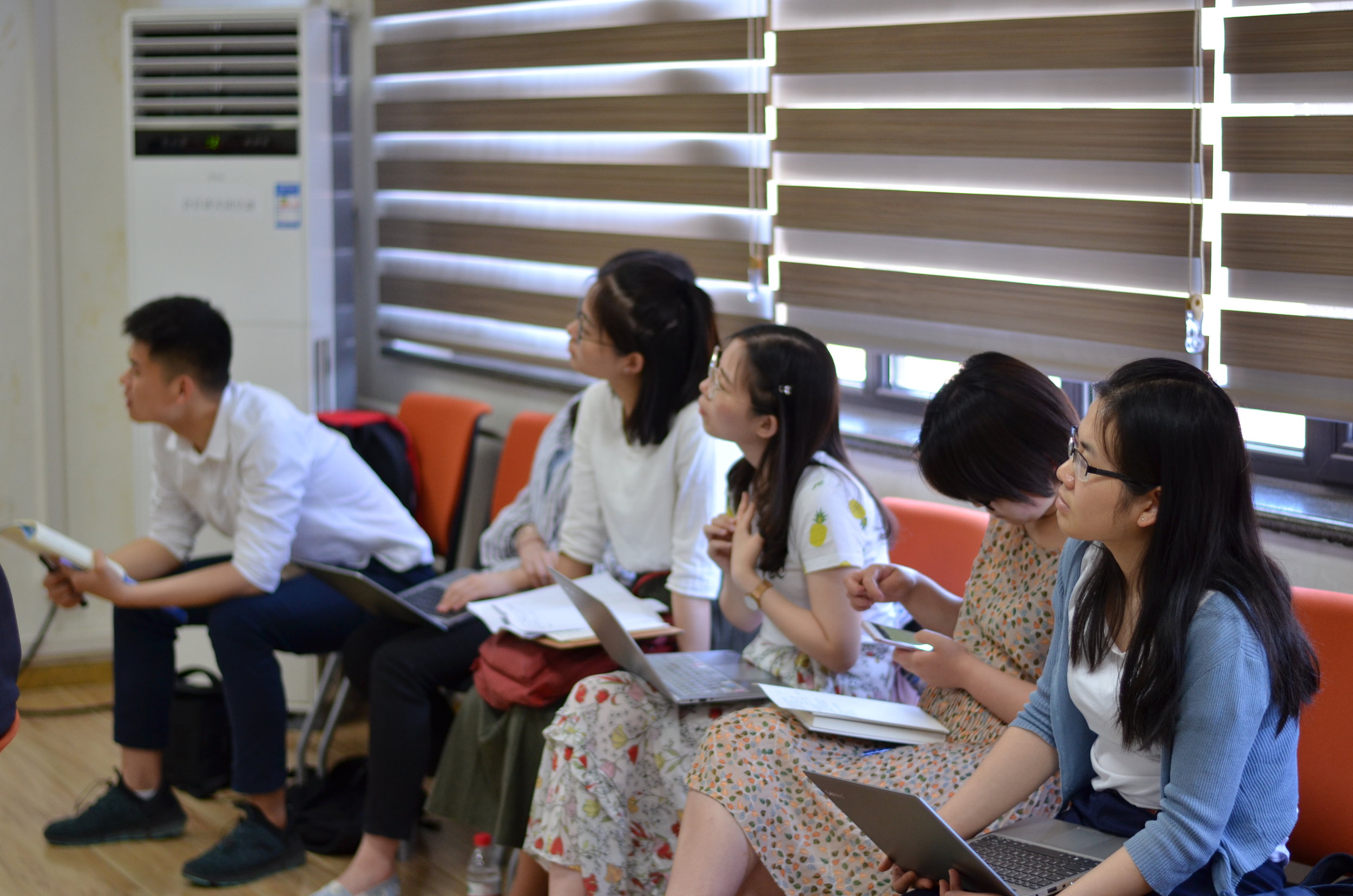 Students listening to presentation at Renmin University