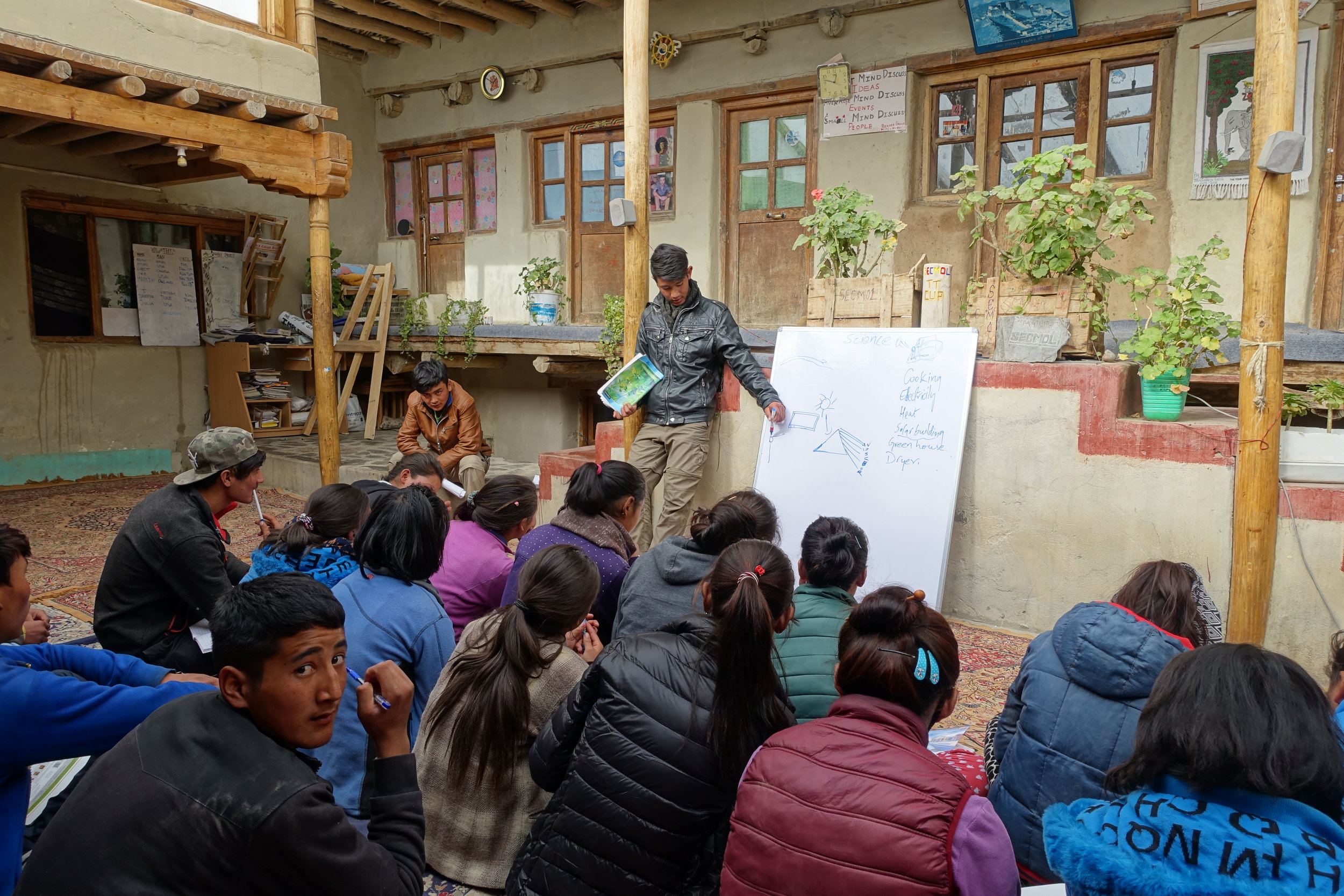 The SECMOL students enjoying an interactive lecture about solar energy and heating