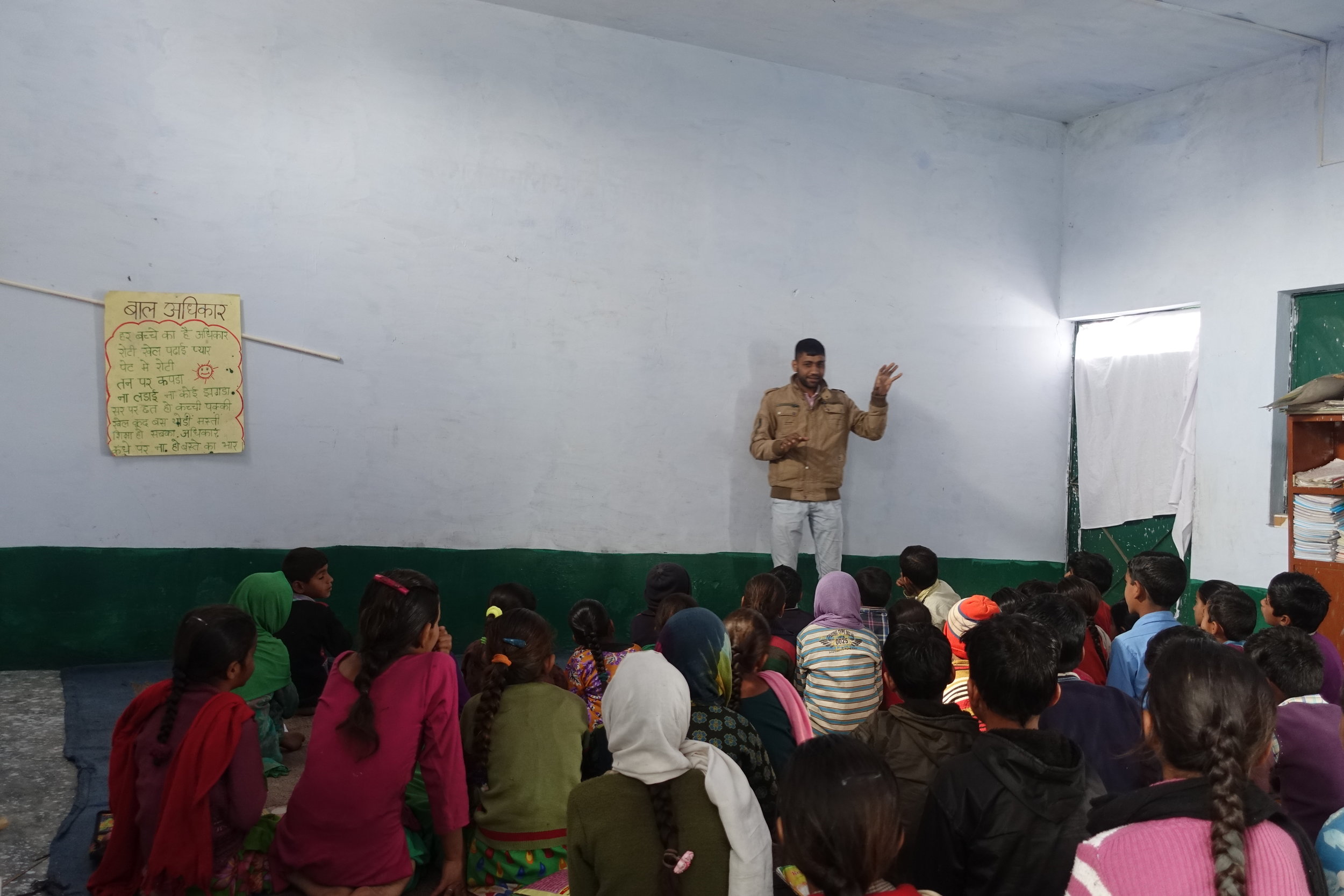 Nature class for young school children led by one of NSI's outreach coordinators, Taukeer.