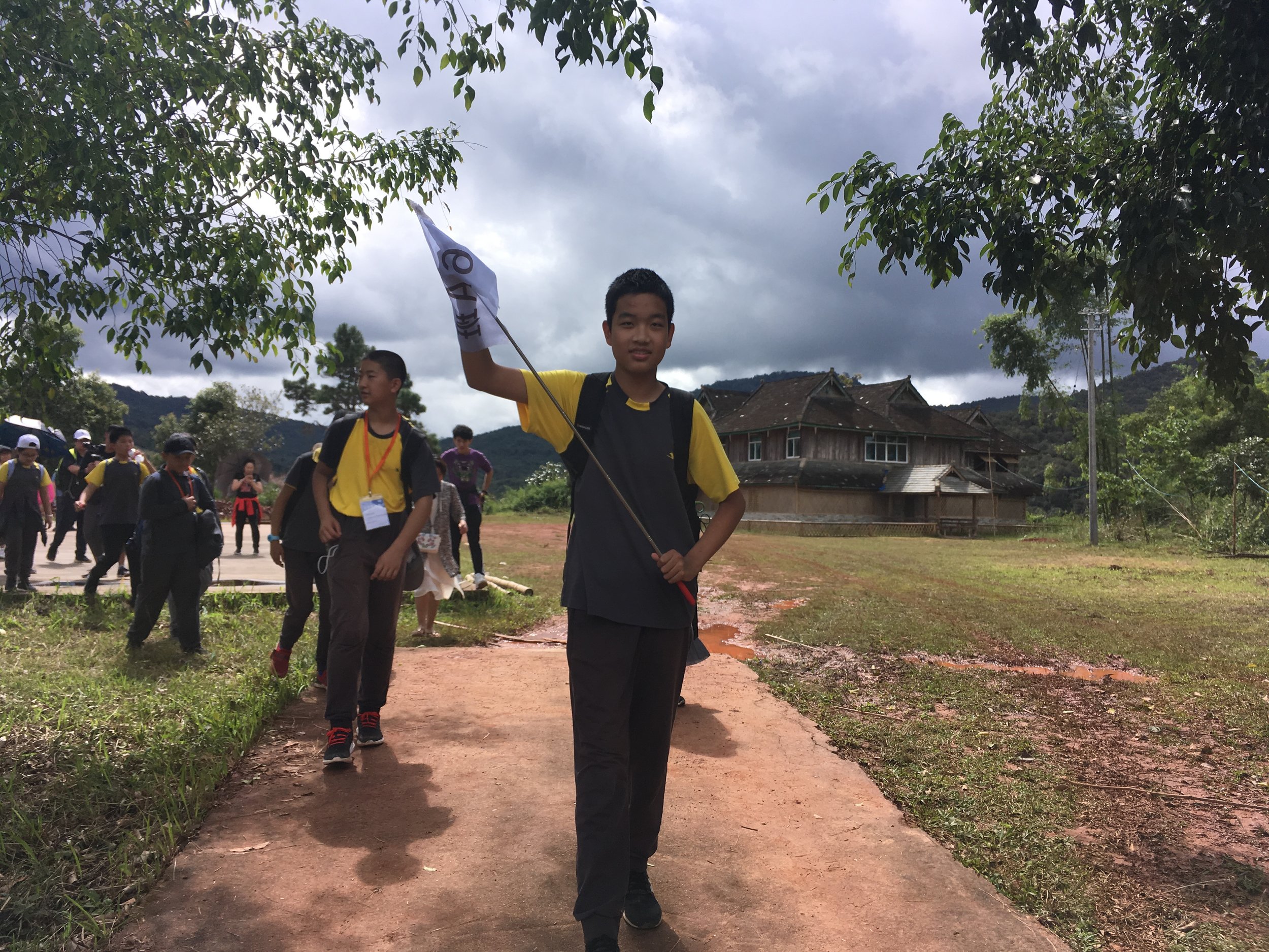 01-5 Students head to village after museum tour.JPG