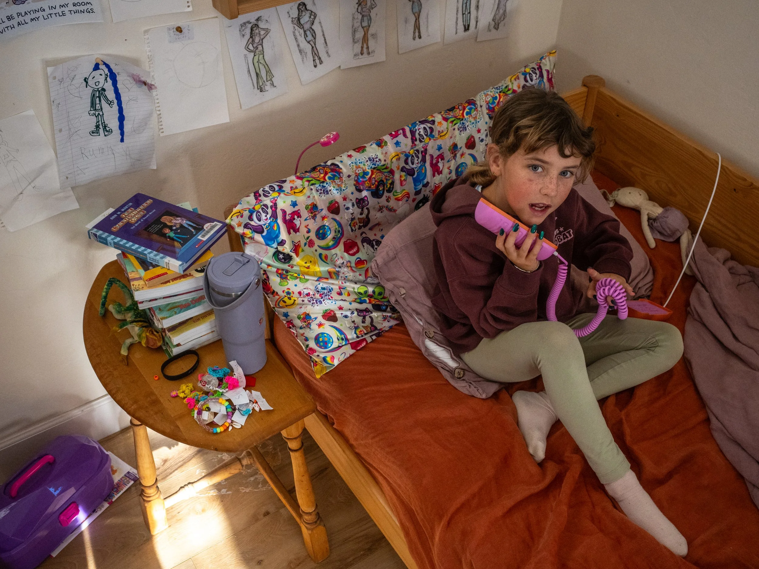 June Trevellyan takes a very important phone call in her home in Oceanside, Calif. 