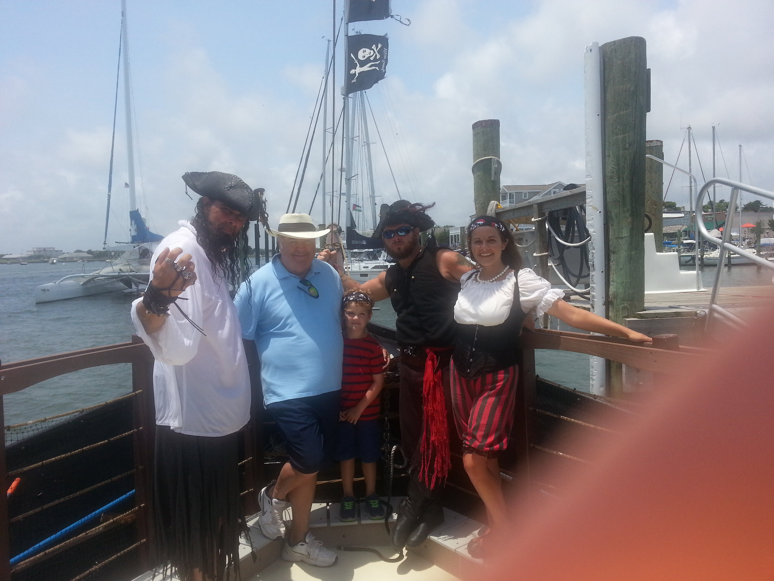 Judge Hunter Enjoying some time With some Pirates and his Grandson at the Beaufort pirate invasion.
