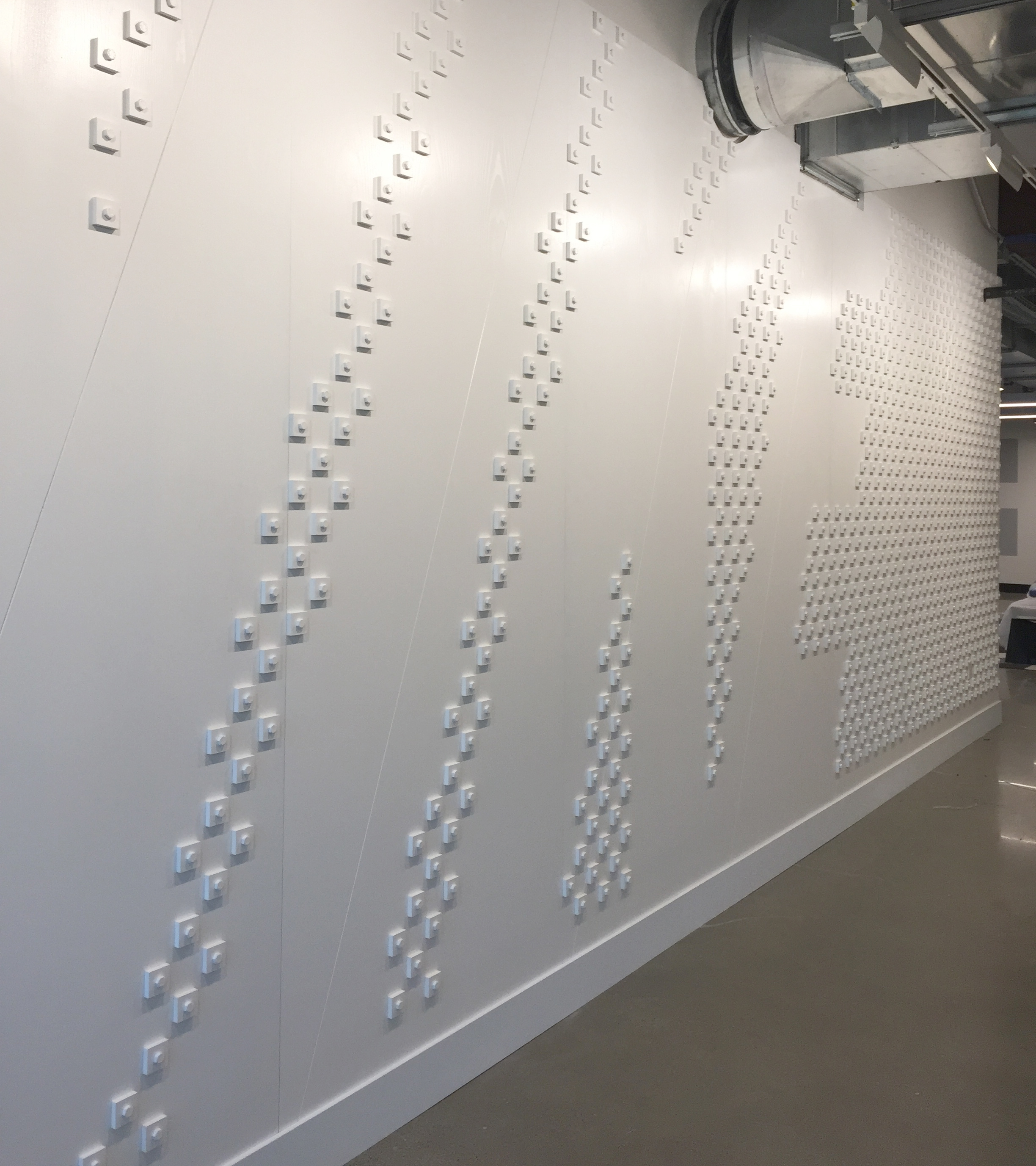 Custom bolt & pixel typographic wall installation for Nike Pittsburgh.