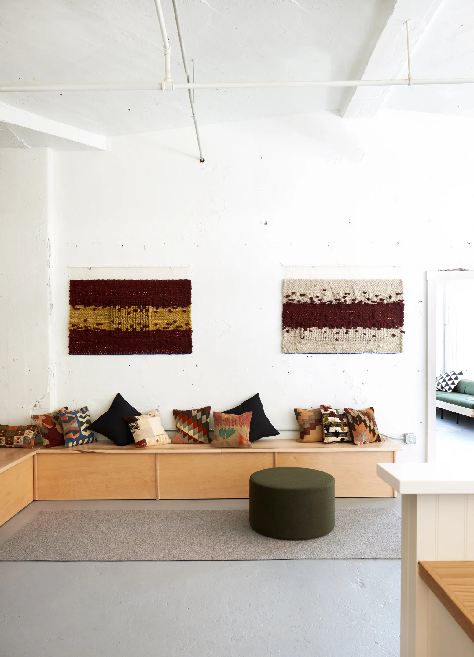 Custom designed maple bench banquette seating.