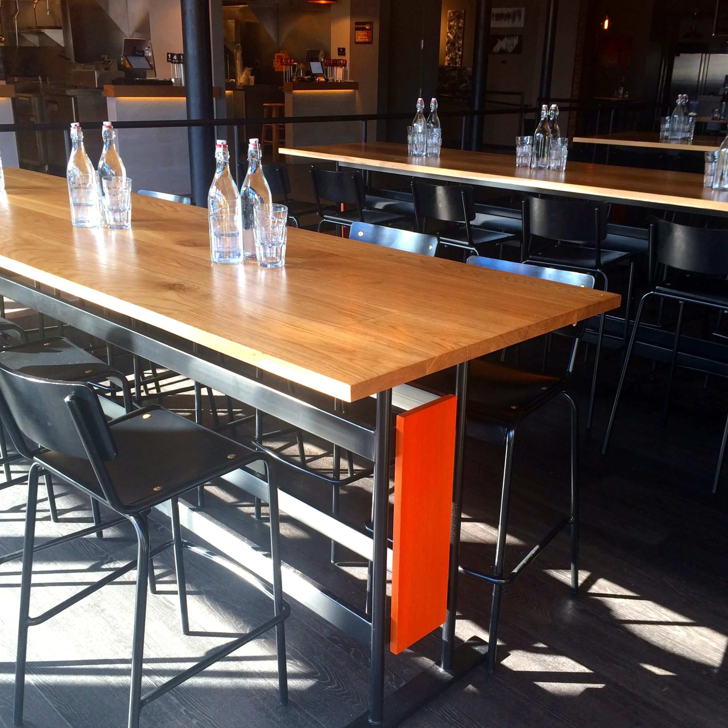 Custom white oak and steel high top dining table.