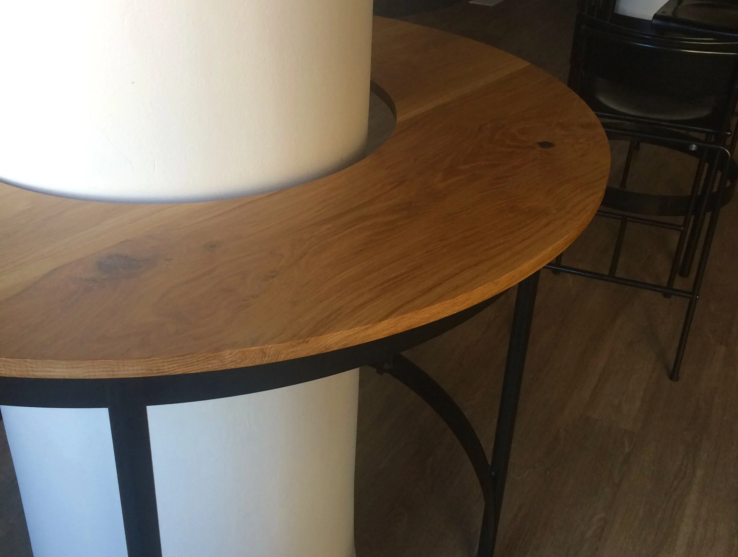 Custom white oak and steel high top circular drink rail..