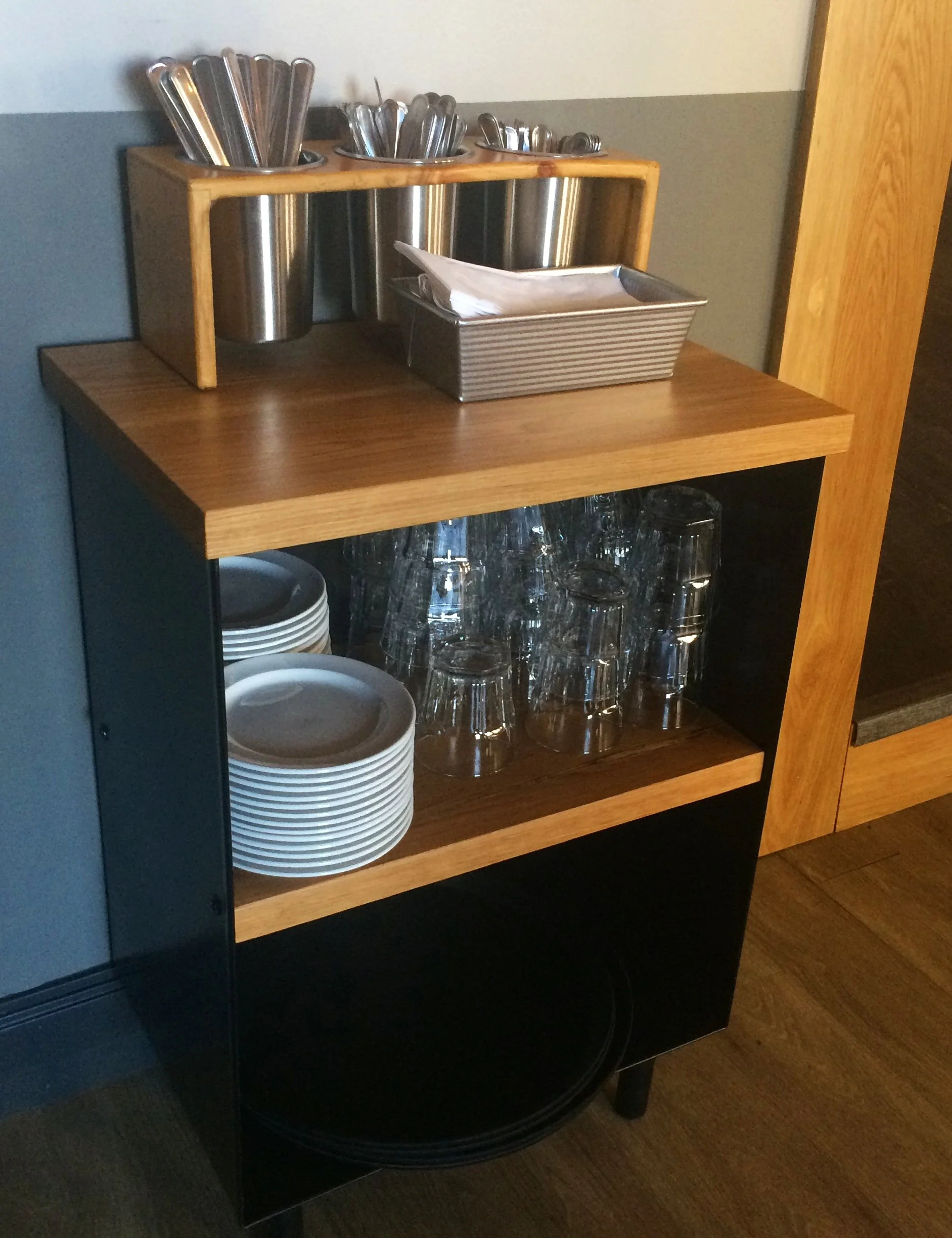 Custom designed white oak and steel server station.