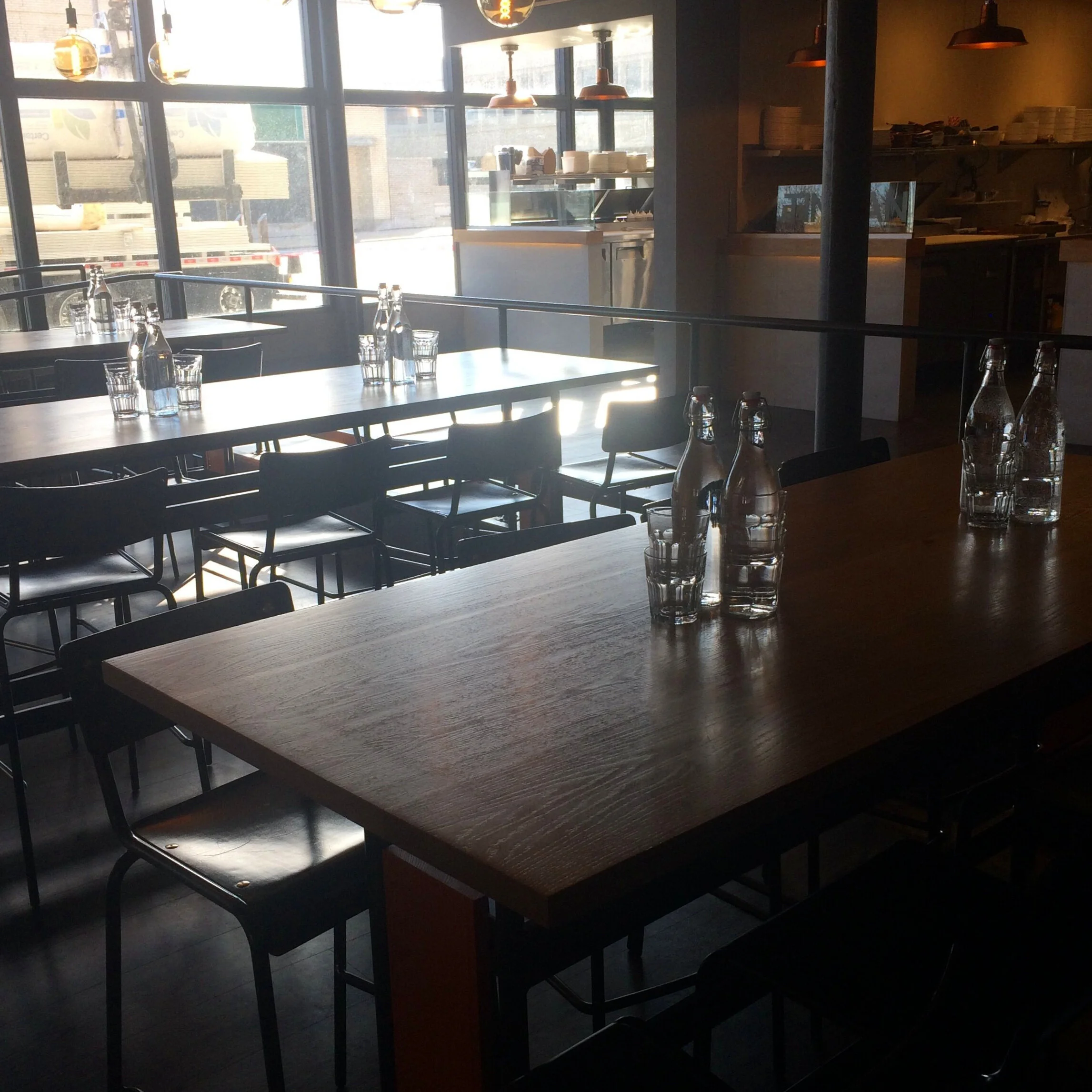 Custom white oak and steel high top dining table.