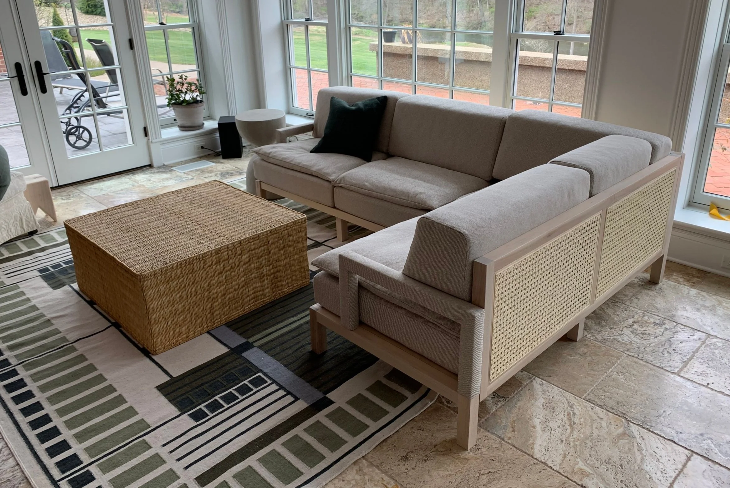 Custom maple whitewashed sofa; couch with caned back panels and down pillowed cushions.