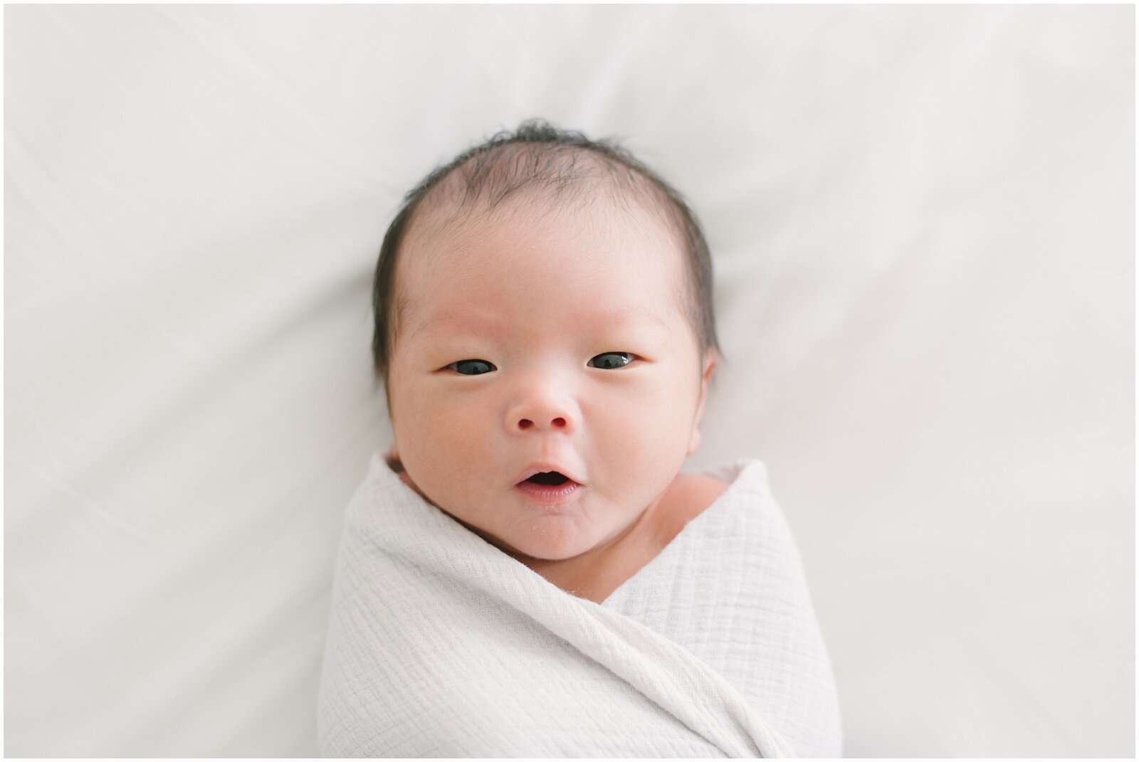  Baby boy newborn - awake and alert. NKB Photo New Jersey.  