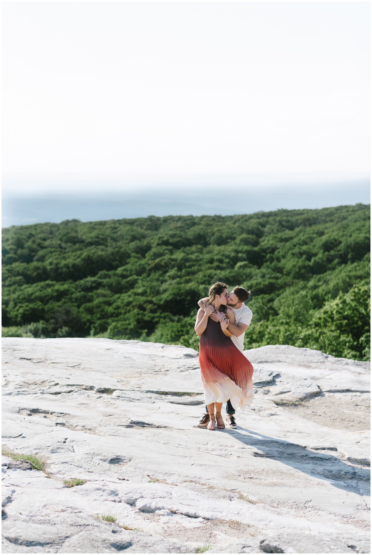 Couple kissing during Minnewaska State Park engagement session | NKB Photp