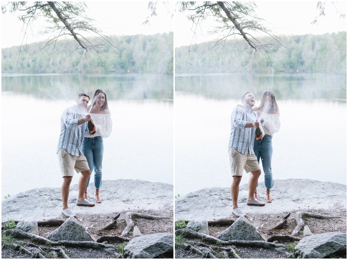 Couple popping bottle of champagne during Minnewaska State Park Engagement Session | NKB Photo