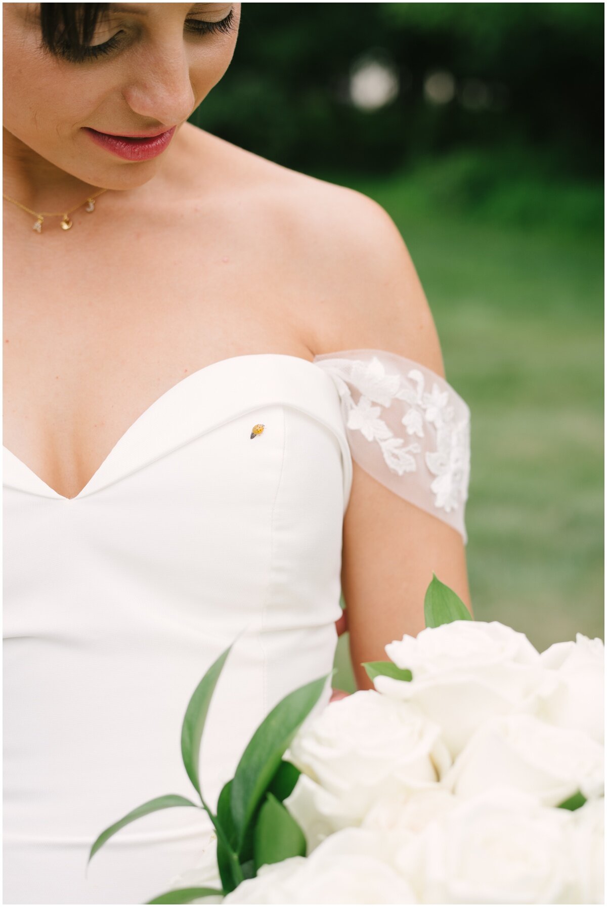  Bride with ladybug on dress during private estate wedding 