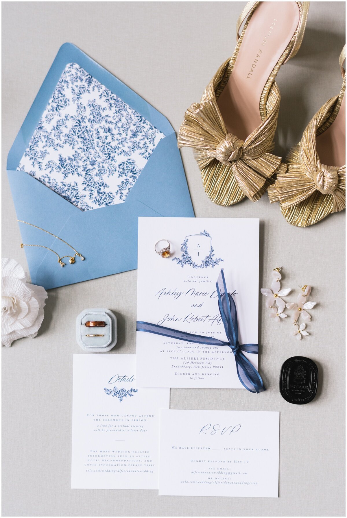  Blue floral wedding invitations, gold shoes with bow during private estate wedding 